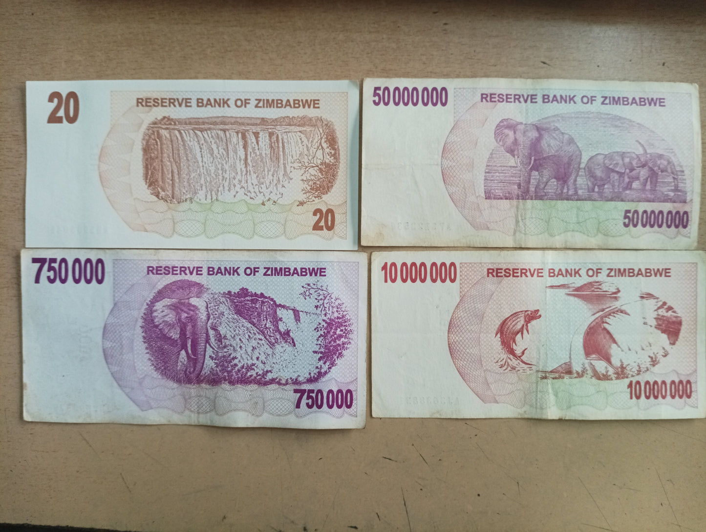 Set of 4  Denomination Bank Notes - 20/7,50,000/10 Million /50 Million Dollars (Random Serial Number) - Zimbabwe